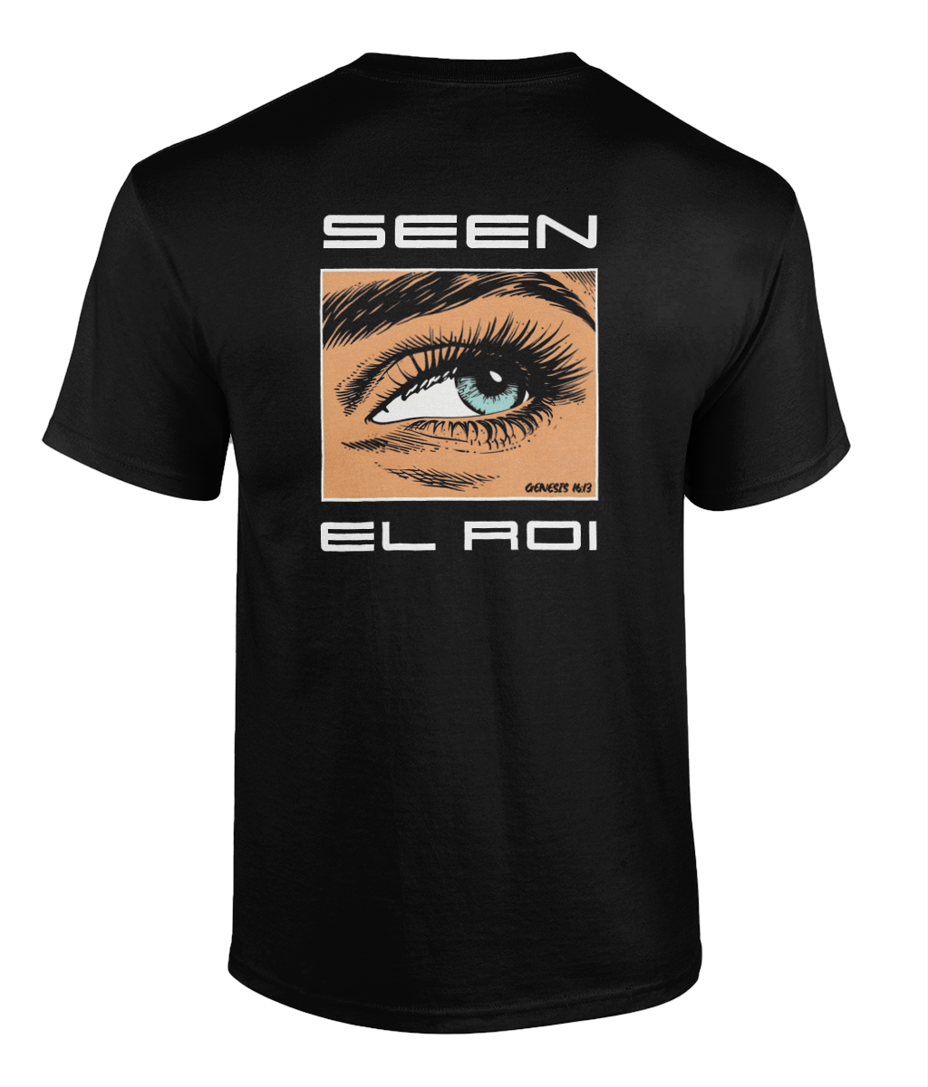 Black Christian graphic t-shirt featuring a detailed illustrated blue eye with the words "SEEN" and "EL ROI," referencing Genesis 16:13 and the biblical name for God meaning "The God Who Sees Me." Modern faith-based streetwear design displayed on black, blue, and olive green shirts.