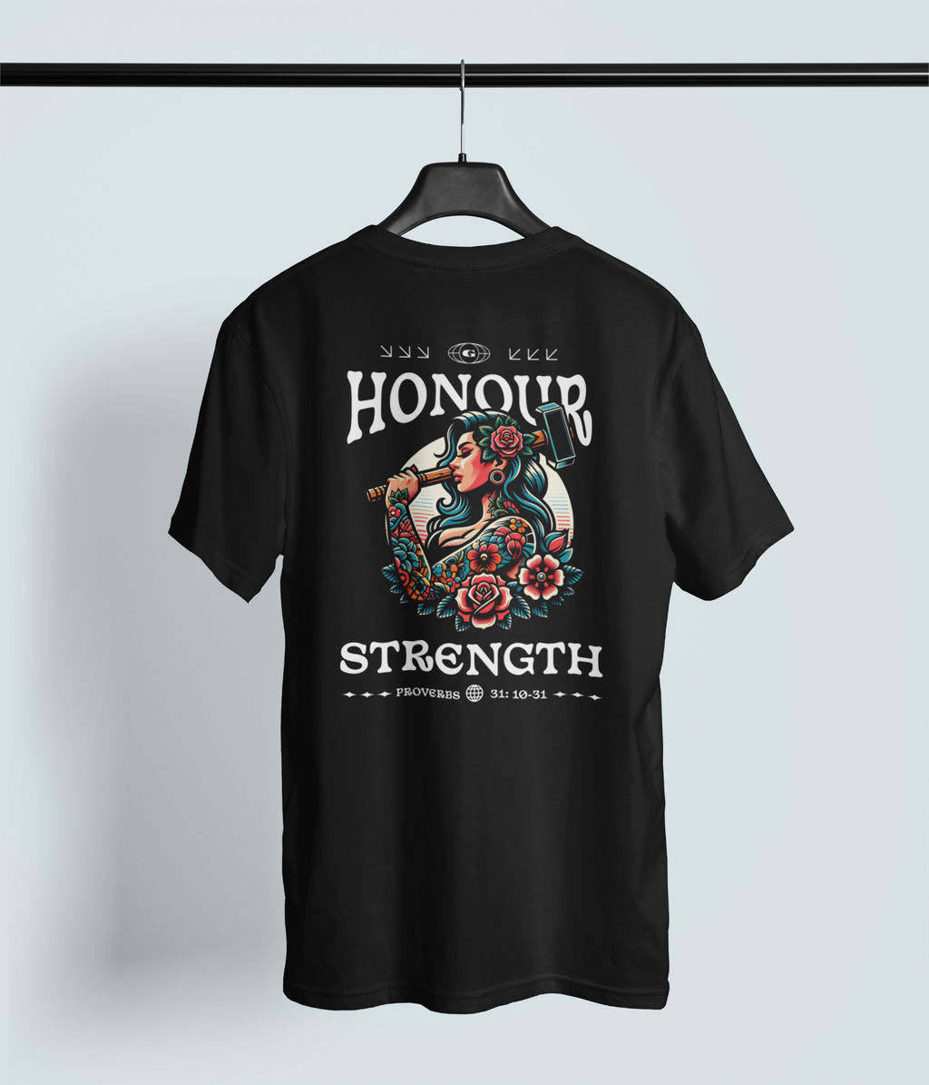 Strength Of A Woman Christian streetwear t-shirt featuring a tattoo-inspired floral woman illustration and Proverbs 31 scripture design on a black tee
