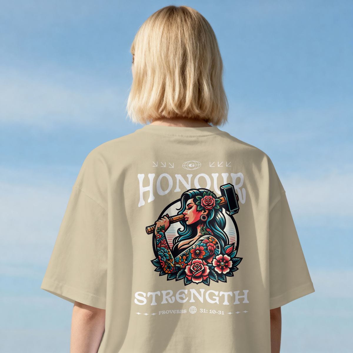 Strength Of A Woman Christian streetwear t-shirt featuring a tattoo-inspired floral woman illustration and Proverbs 31 scripture design on a black tee